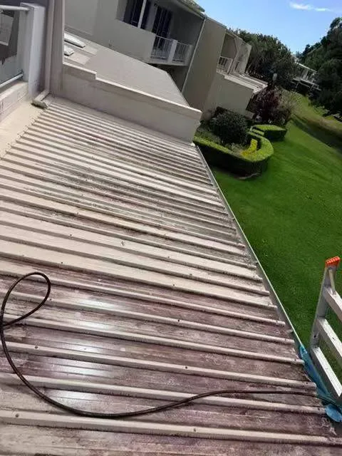Before cleaning: deposits on corrugated exterior surface