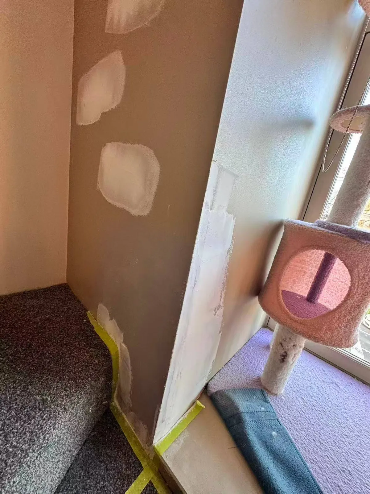Wall patches prepared for the painting stage